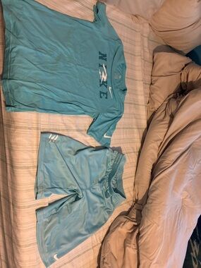 Nike 3 Brand light blue Short Sleeve Athletic Top and Shorts.